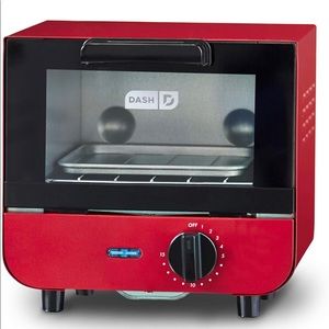 Brand new in box Dash mini toaster in red